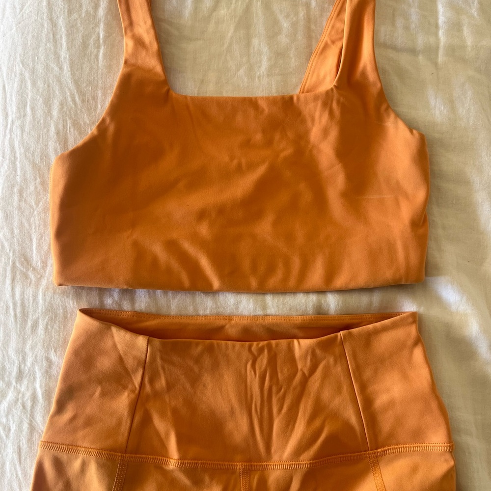 girlfriend collective orange ribbed sports bra and high-waist biker shorts - Picture 4 of 4